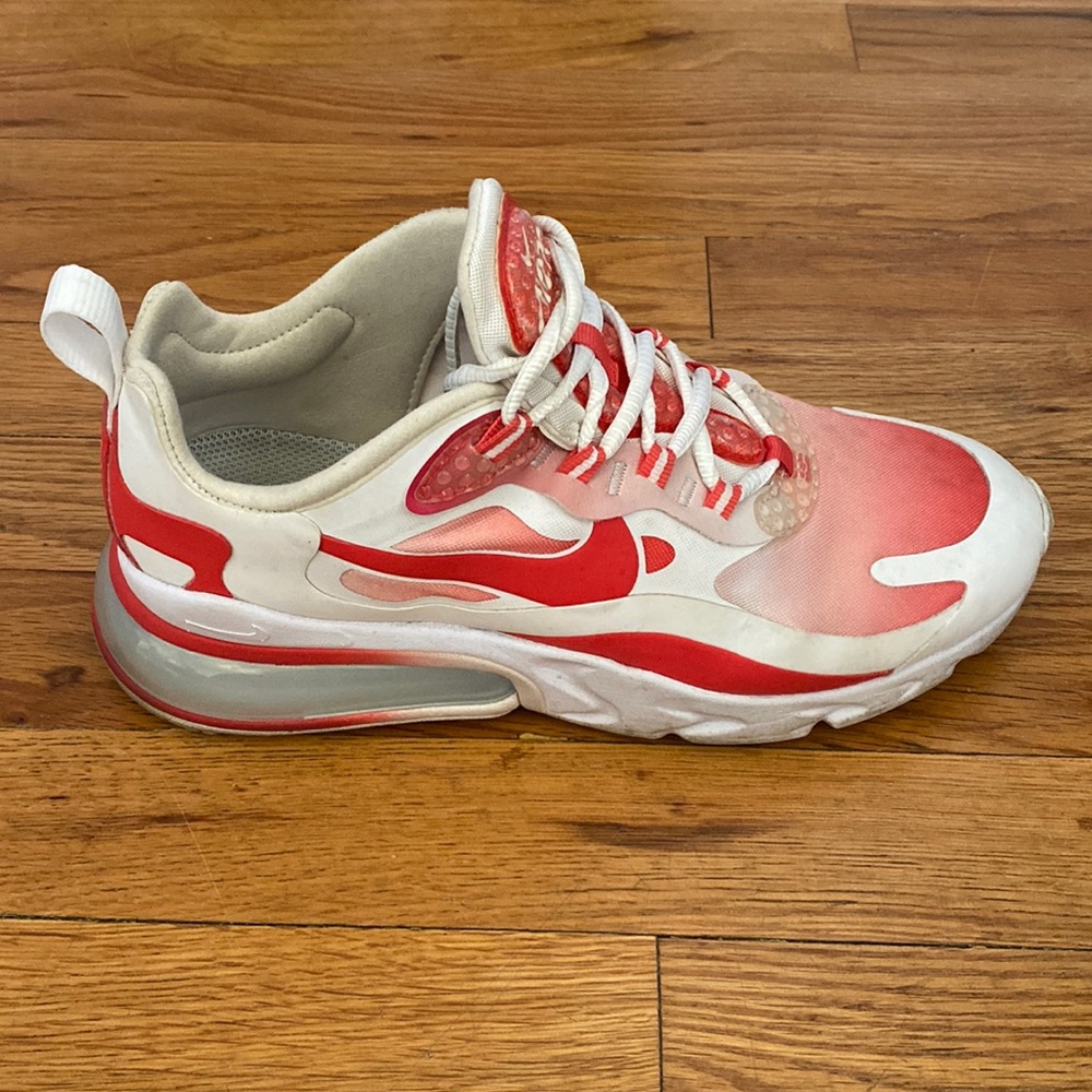 Red, pink, and white Nike Air 270 reacts